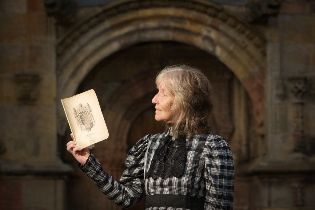 Rosslyn Chapel Guide Maureen Moffat with an antique guidebook for the Chapel, dated 1827. The guidebook, which has just been acquired by Rosslyn Chapel Trust, was published in Edinburgh by Oliver &amp; Boyd and J &amp; I Johnstone and is priced 4s 6d. It was purchased in a bookshop in Germany in 1990 and recently donated, making it the earliest guidebook to the Chapel in the Trust’s care. It will require some conservation treatment and will eventually be displayed in the Chapel’s Visitor Centre. MORE INFO IAN GARDNER 0131 440 2159